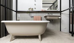 Grigio Orsola Honed floor with Yohen Border YB102 mosaic wall and Agape Ottocento bath and basin with Memory illuminated mirror.jpg