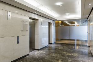 Grigio Imperiale Polished floor and Rocca Bianca Polished walls. Angel Place, Sydney.jpg
