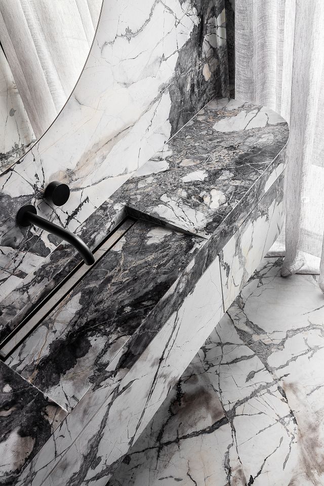 Concordia Honed to bathroom floor, wall and vanity. Scalpellino House by Biasol