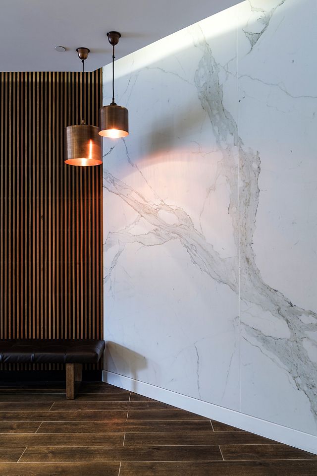 Calacatta Matt veinmatched wall. Toga Group. Photography by Willem Rethmeier.jpg