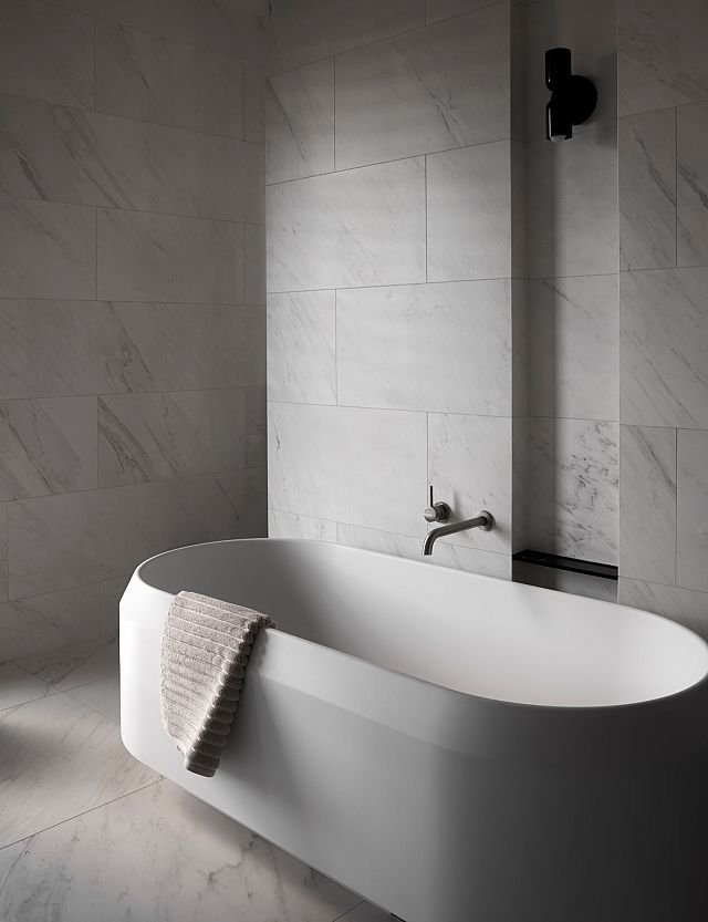MAXIMUM Michelangelo porcelain tiles installed to bathroom walls and floor with Agape Lariana Bath .jpg