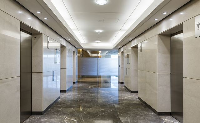 Grigio Imperiale Polished floor and Rocca Bianca Polished walls. Angel Place, Sydney.jpg