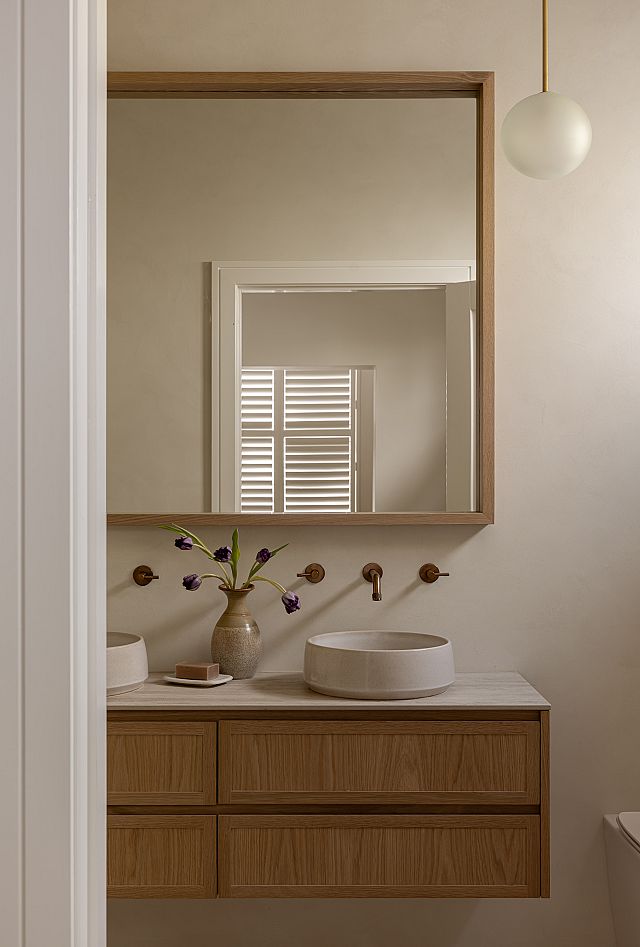 ​Artetech Pietra vorio bathroom benchtop at Bishops Ave by Kate Lawrence Interiors​. Photography Nat​ Spada​