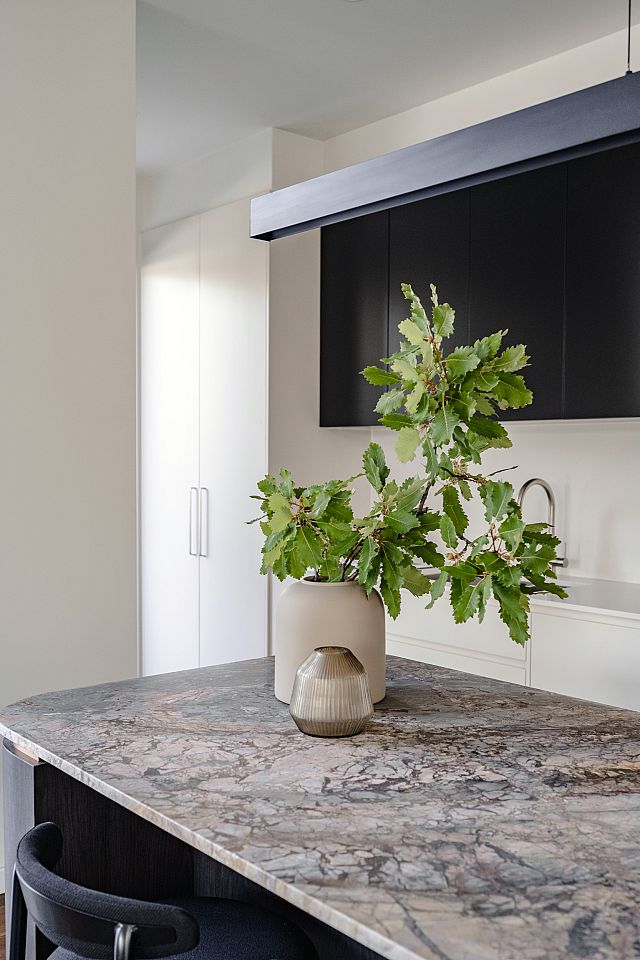 Cosmeria benchtop is a marble with pink, brown, and orange hues.