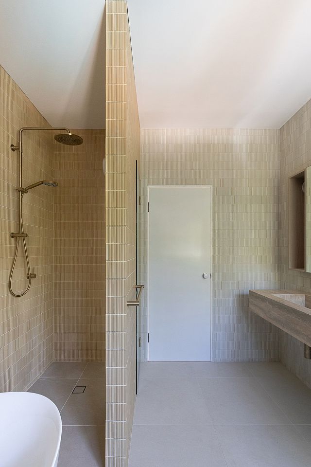 Dune Seashell floor tiles and Hashi Border HA-MWH:9925 and HA-ORN:47 mosaic tiles. Design by AWA Studio and Photography by Joanne Ly