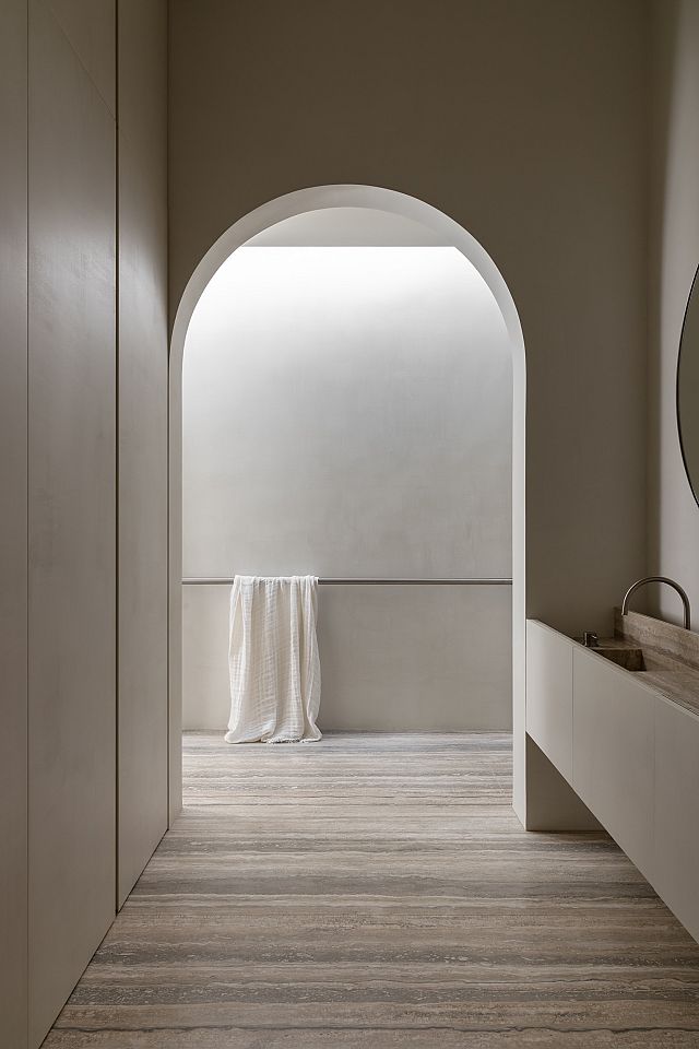 Silver Travertine bathroom floors and vanity at Armadale House by Selzer Design. Photography by Timothy Kaye.jpg