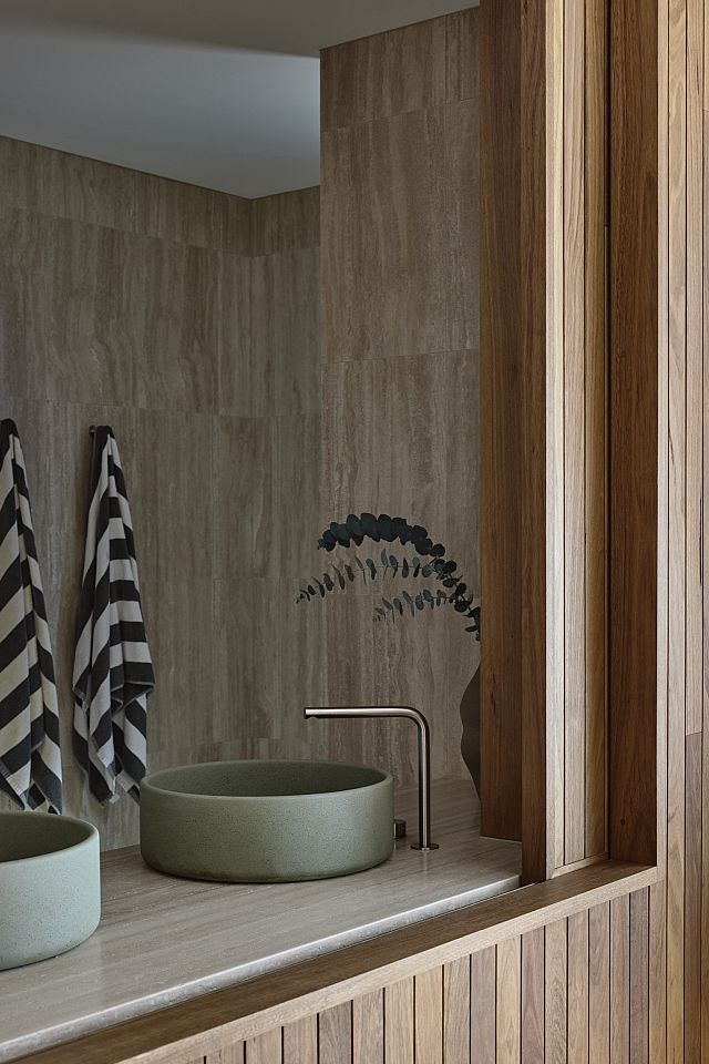 Travertine Lait wall and benchtop at Avocado House by HGA Studio. Photos by Derek Swalwell 