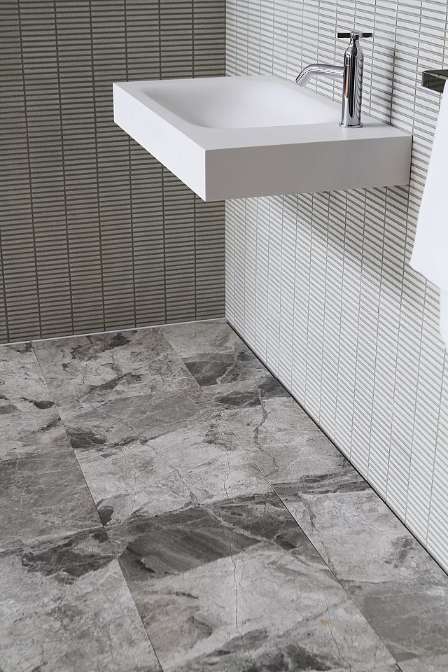 Teragio honed tiles to floor with INAX Yohen Border mosaic and 815 AgapeBasin.jpg