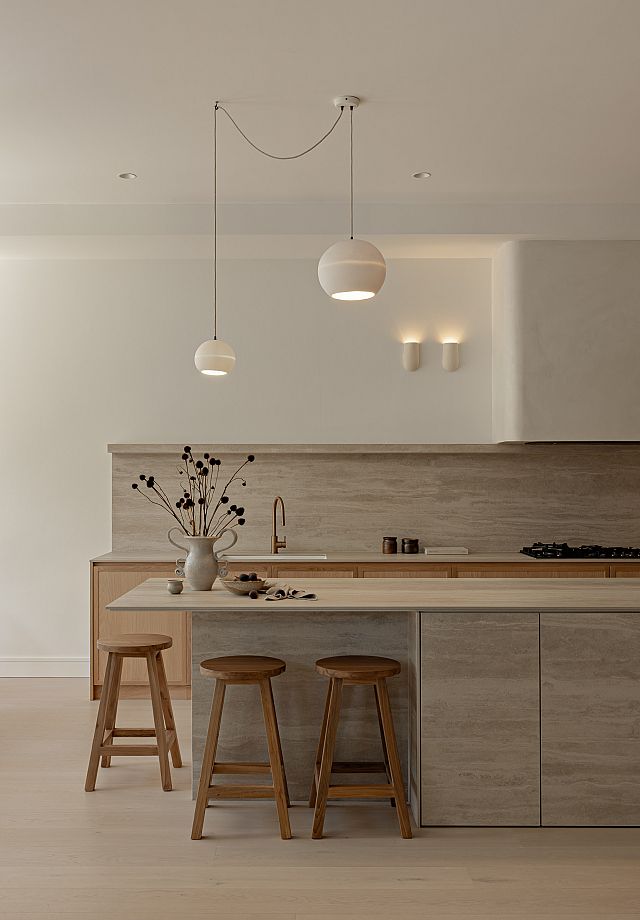 ​Artetech Pietra Avorio kitchen island, benchtop and splashback at Bishops Ave by Kate Lawrence Interiors​. Photography Nat​ Spada​