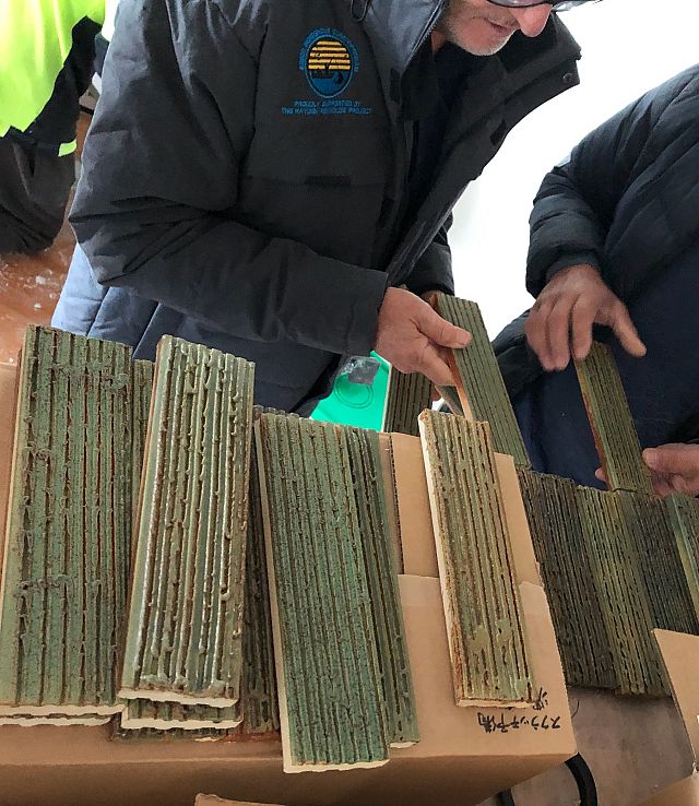 John looking at his Keramos Bamboo order .jpg