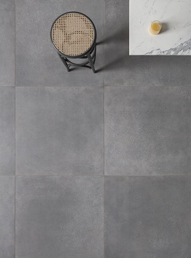 Seeds Stone Grey is a grey porcelain floor tile by Decoratori Bassinesi