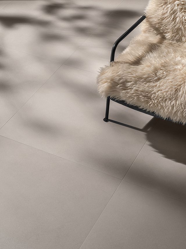 Seeds Chalk is an off white porcelain floor tile by Decoratori Bassinesi