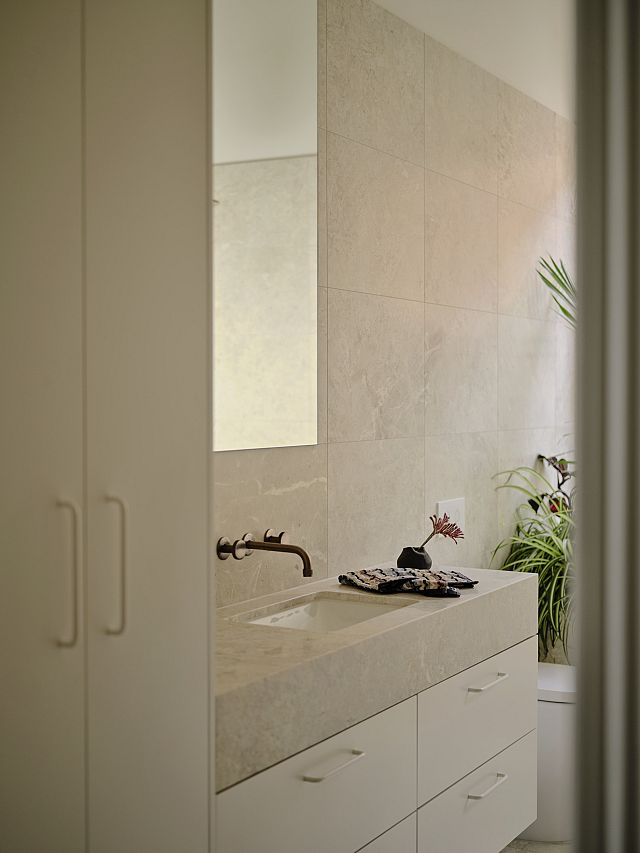 Grigio Orsola on floor, walls and vanity bench top at Salmon House by Dan Gayfer. Photos by Dean Bradley