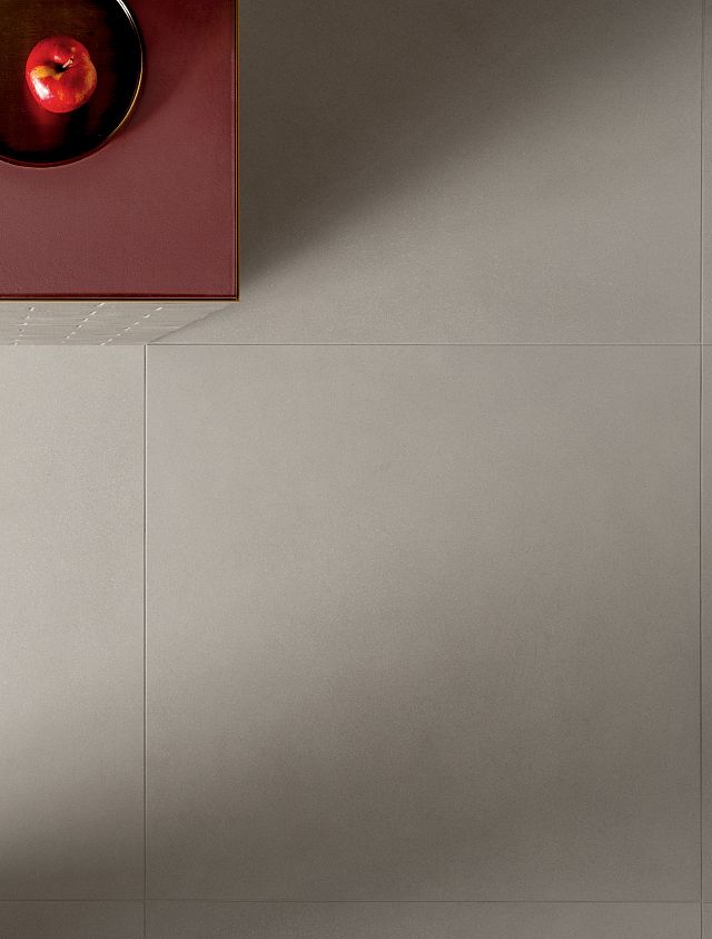 Seeds Chalk is an off white porcelain floor tile by Decoratori Bassanesi