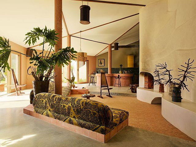 Cotto Manetti Terracotta Arrotato Da Crudo clad kitchen with Magnesia Brushed splashback. Handmade Portofino terracotta tiles line the floor with Tumbled Square Terracotta Mosaics on the columns at Sun Ranch. Photography by Anson Smart and Styling by Jose