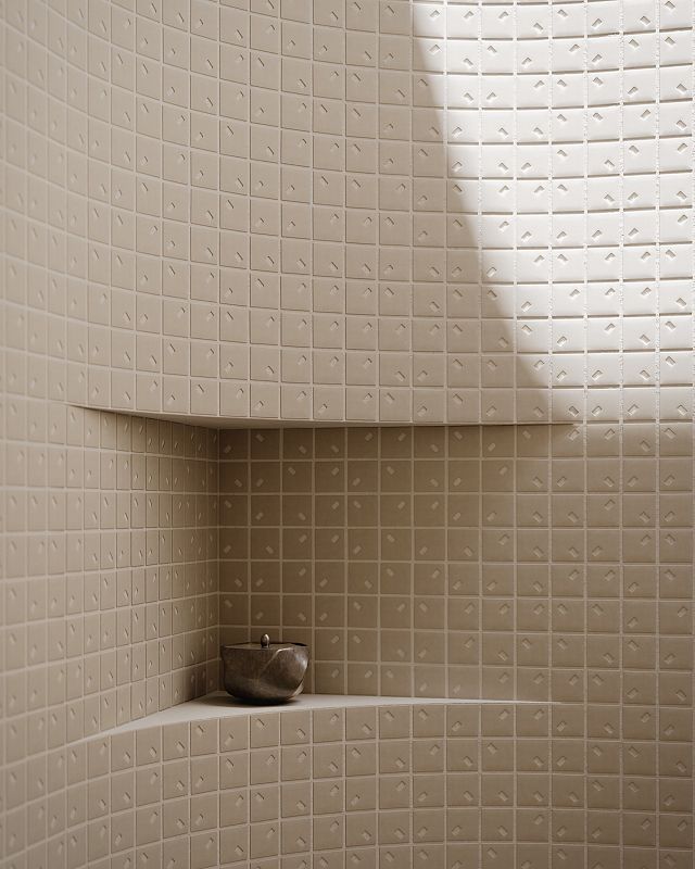 Rain Range, by DB Studio for Decoratori Bassinesi, is an off-white/cream textured porcelain mosaic suitable for indoor and outdoor application