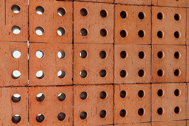 Bloc by Ronan & Erwan Bouroullec is a terracotta brick produced with the artisanship extrusion process by Mutina. It’s a three-dimensional element conceived to build architectural and decorative structures.