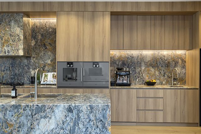 Kalana kitchen island, benchtop, splashback and rangehood at Ramon by Saba Projects. Photography by EOS.jpg