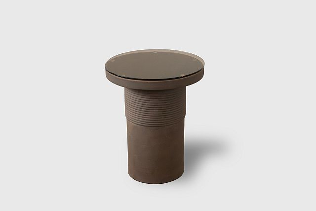 Bound Table designed by Locki Humphrey for New Volumes in marrone terracotta with glass top