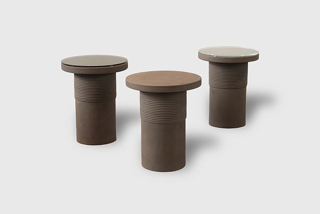 Bound Table designed by Locki Humphrey for New Volumes in marrone terracotta with glass top