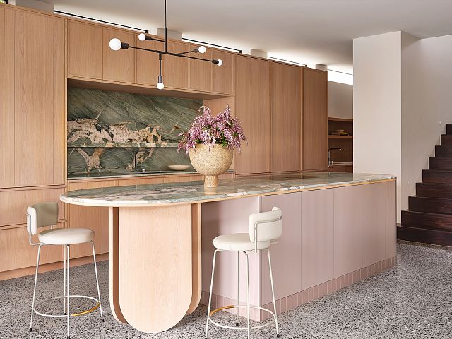 Cristanza stone island, benchtops and splashback at Isaac House by Darren James. Photography by Brock Beazley