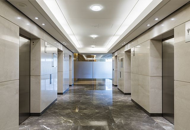 Grigio Imperiale Polished floor and Rocca Bianca Polished walls. Angel Place, Sydney.jpg