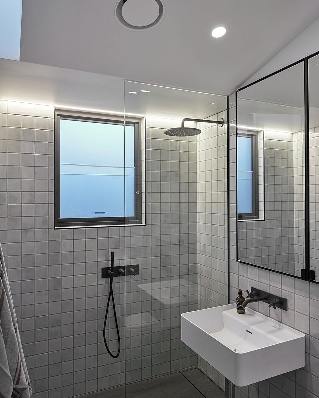 Inax Biyusai mosaics with Agape Memory tapware and Marsiglia basin. By MCK Architects. Build by Emerath Builders.jpg