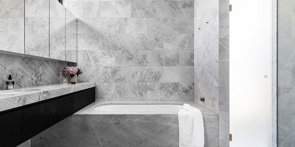"Elba":/products/elba featured on vanity, floors, walls, bath surround.jpg