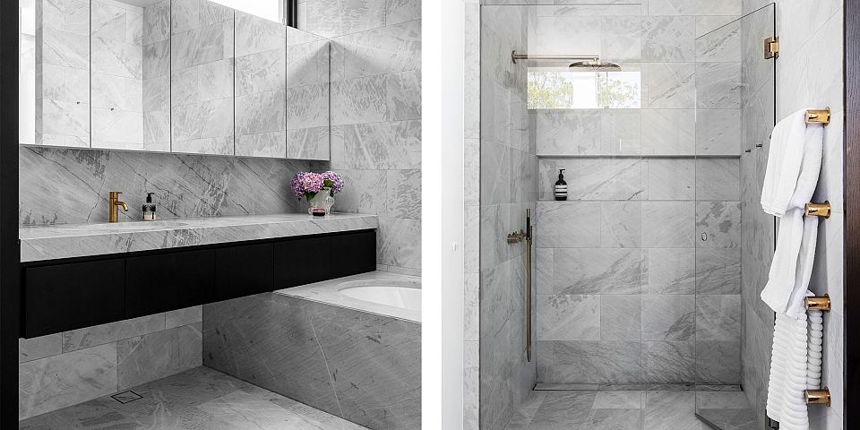 Elba featured on vanity, floors, walls, bath surround and in shower
