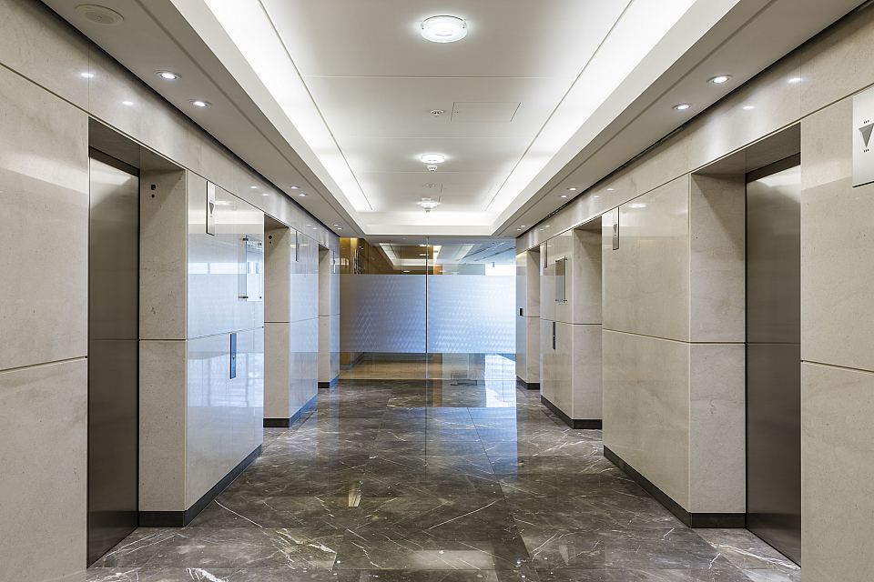 Grigio Imperiale Polished floor and Rocca Bianca Polished walls. Angel Place, Sydney.jpg