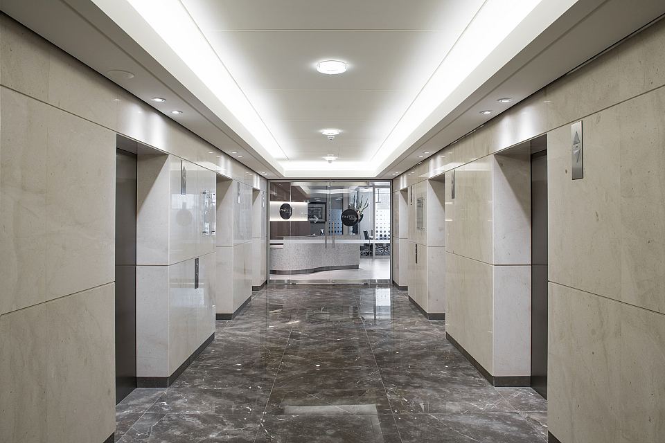 Grigio Imperiale Polished floor and Rocca Bianca Polished walls. Angel Place, Sydney.jpg